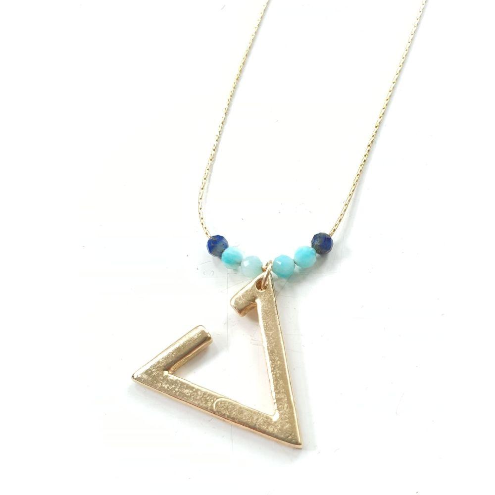A gold necklace with a triangle pendant and a Lapis and an Amazonite.