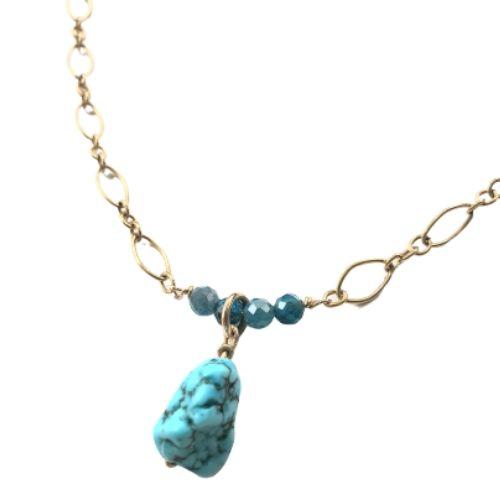 Gold necklace with apathetic stones and turquoise hewitt pendant