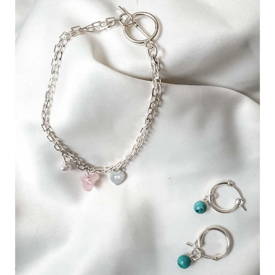 Bracelet en argent double avec des pierres roses de quartz et la perle