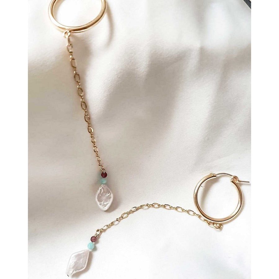 Gold hoop earrings with pearl